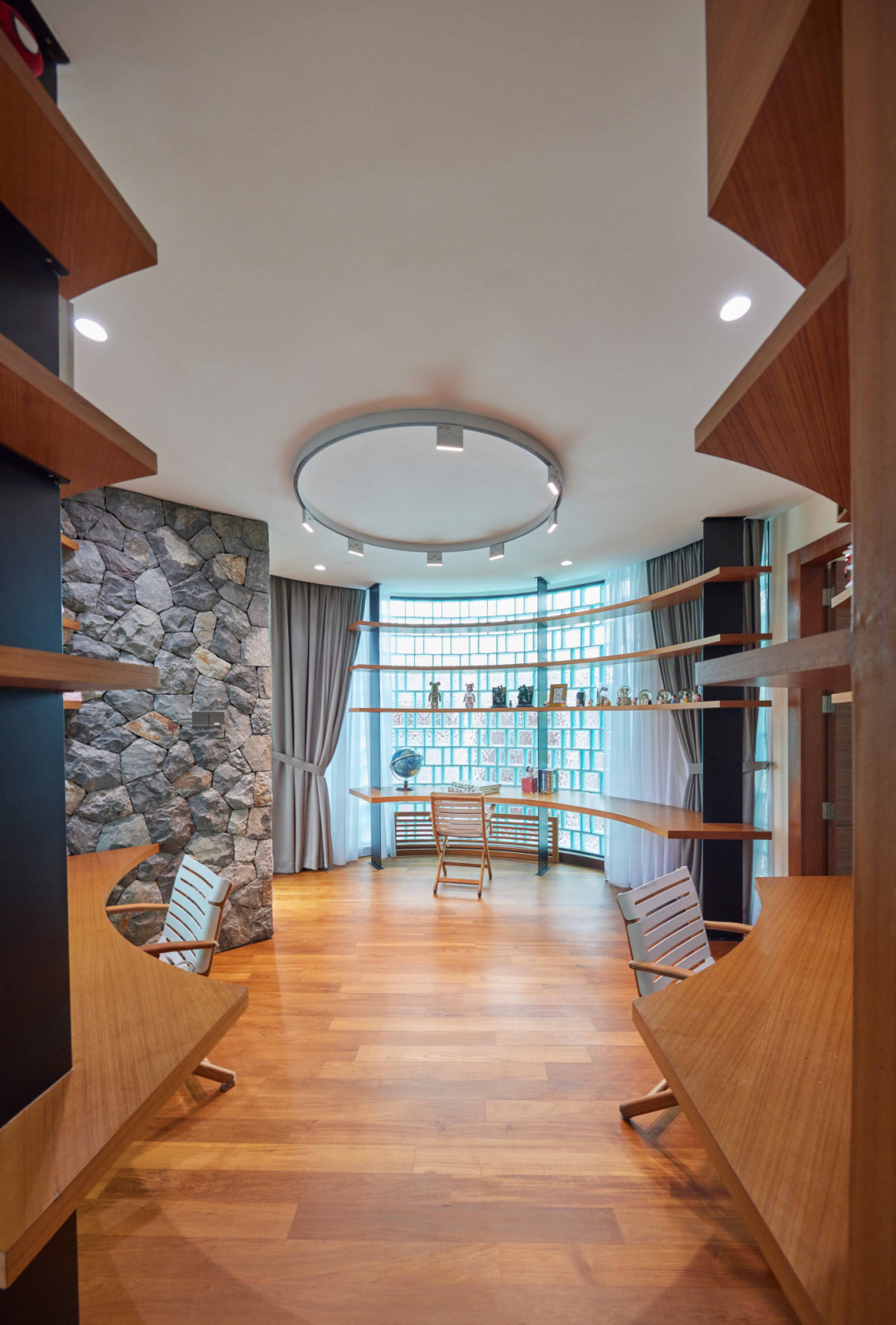 The family’s shared study is located at the bungalow’s distinctively circular form