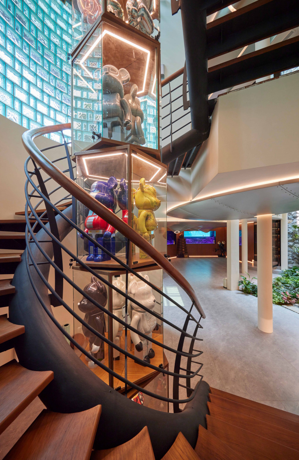 The Tower transforms the space at the heart of the spiral staircase into the bungalow’s crown jewel for Bearbrick display