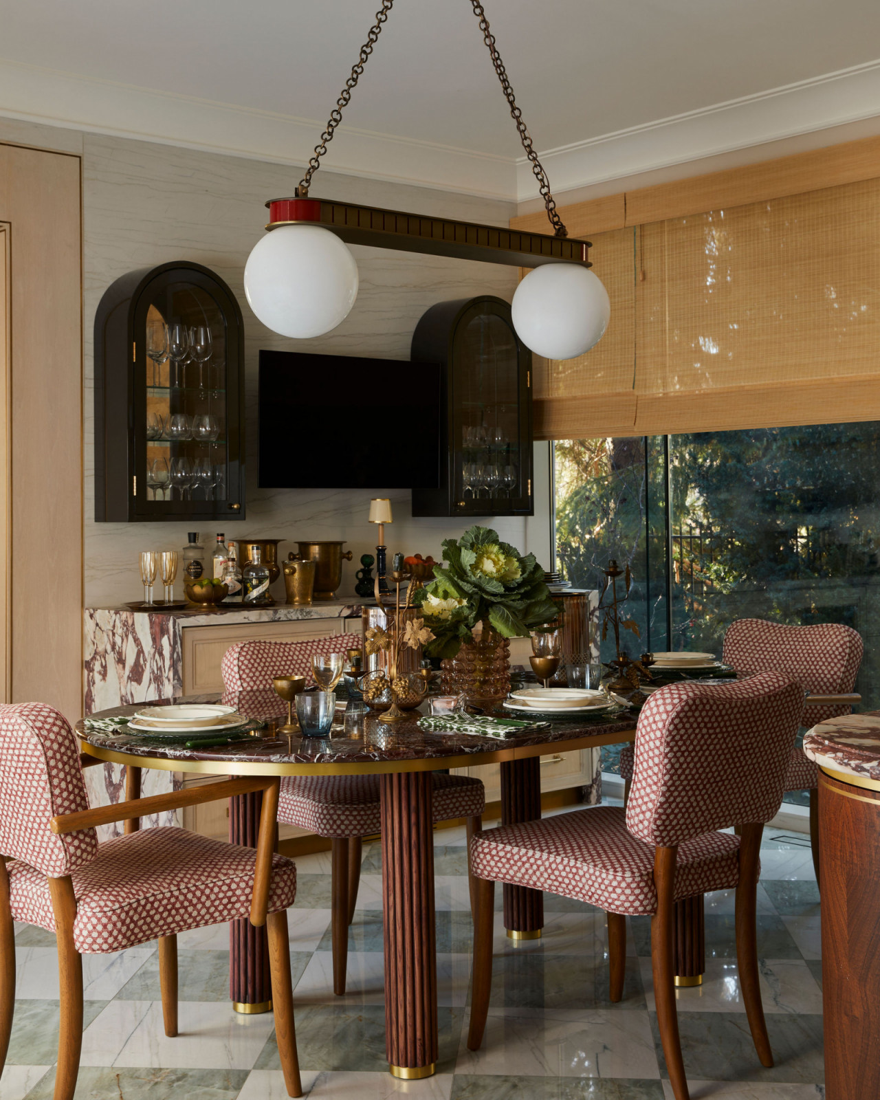 The dining area adjacent to the kitchen in an Ontario, Canada mansion renovated by Sabrina Albanese Interiors