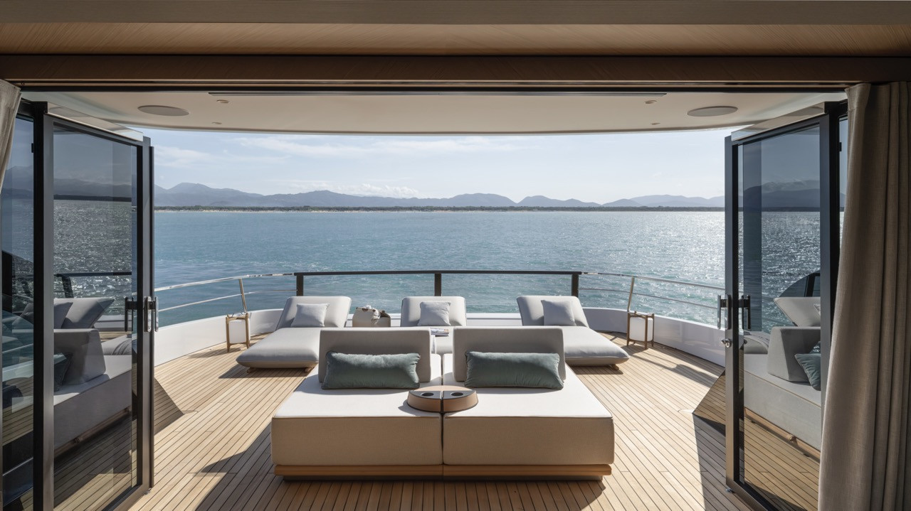 Floor-to-ceiling glass dissolves boundaries between interior comfort and open deck on the Azimut Grande 30M