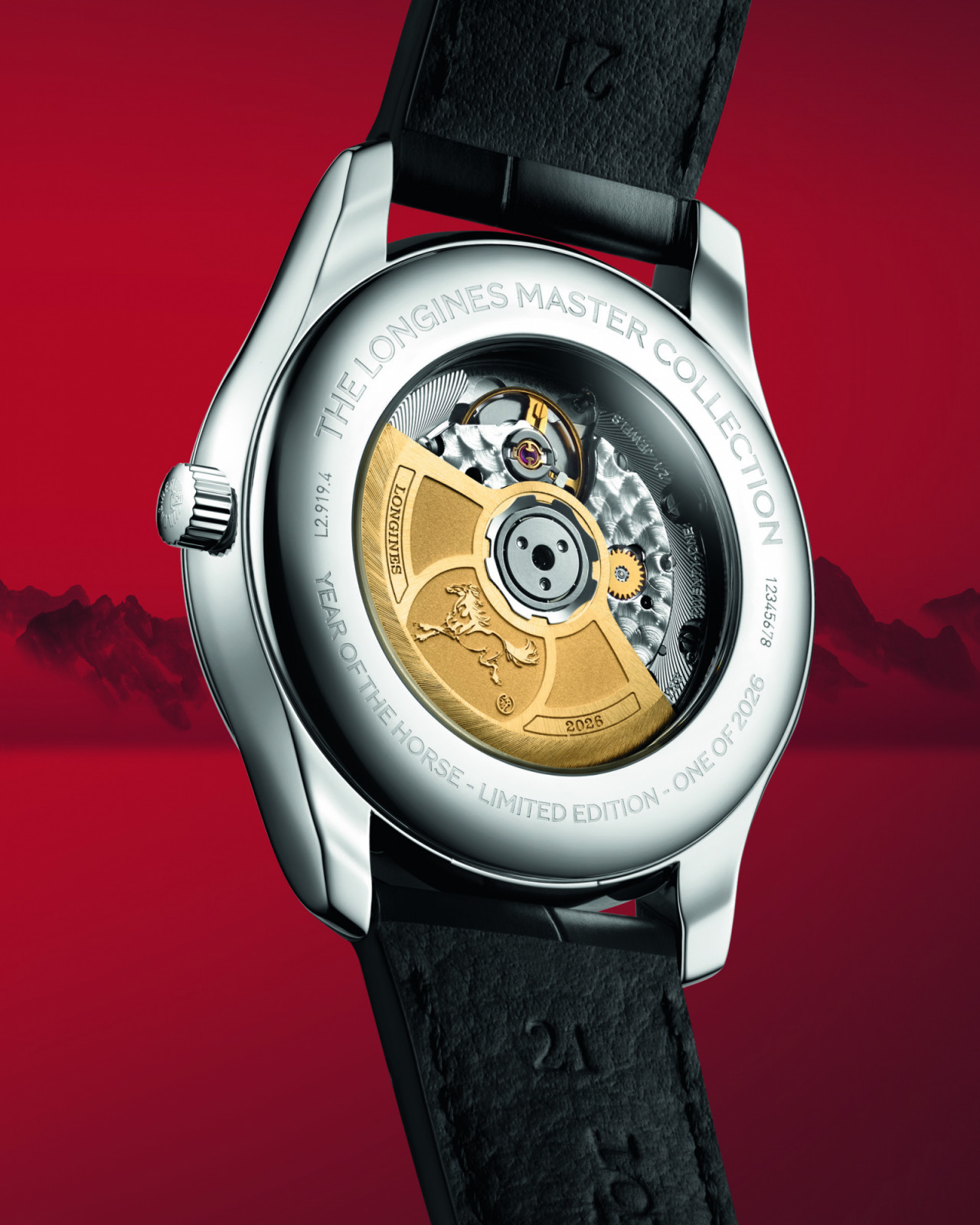 Longines’ yellow gilt rotor engraved with a galloping horse