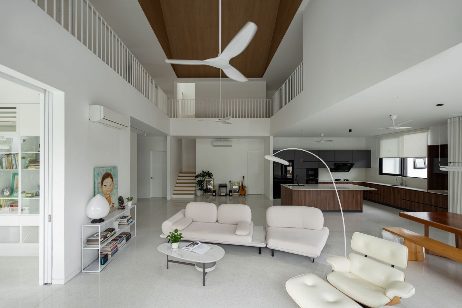 The open-plan ground floor extends onto the front, rear, and side decks (Photo: Bricksbegin)