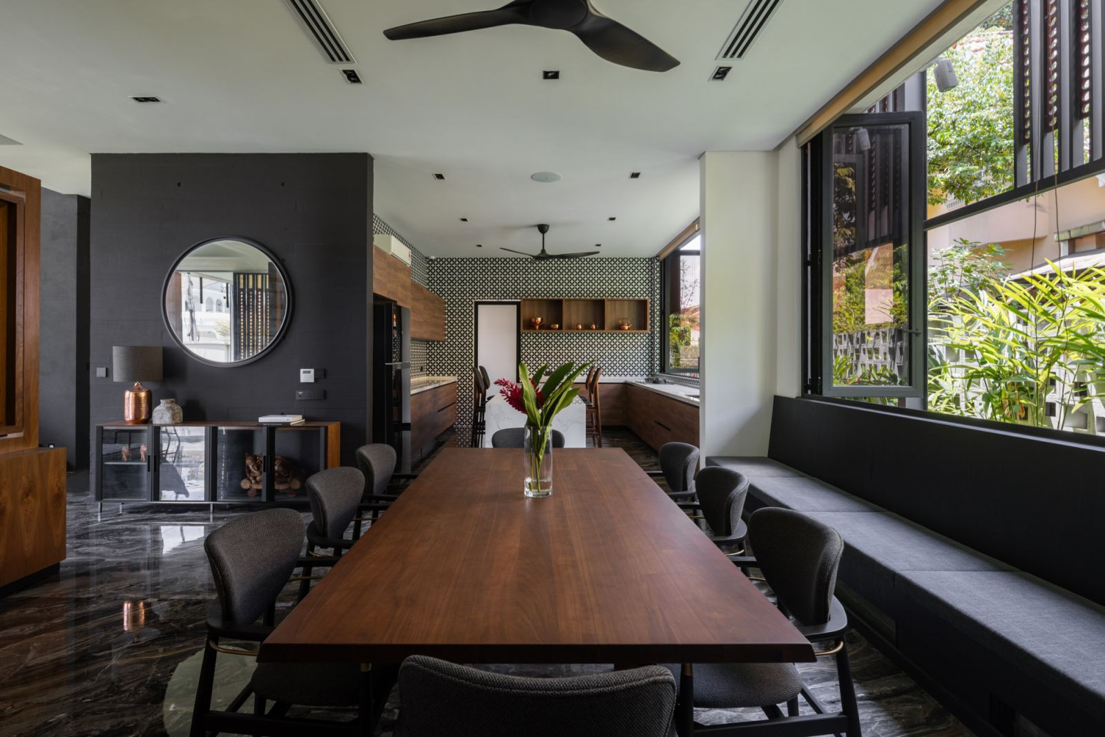 The dining and kitchen areas through a staggered plan (Photo: Pixelaw Photography)