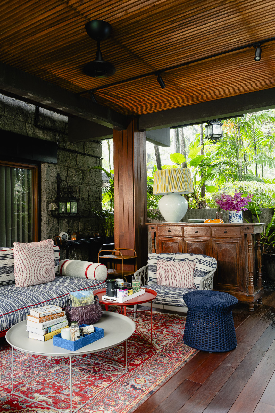 The veranda deck, cooled by steady rain and softened light, where Monique Borja-Gonzalez brings her meditation into the open air