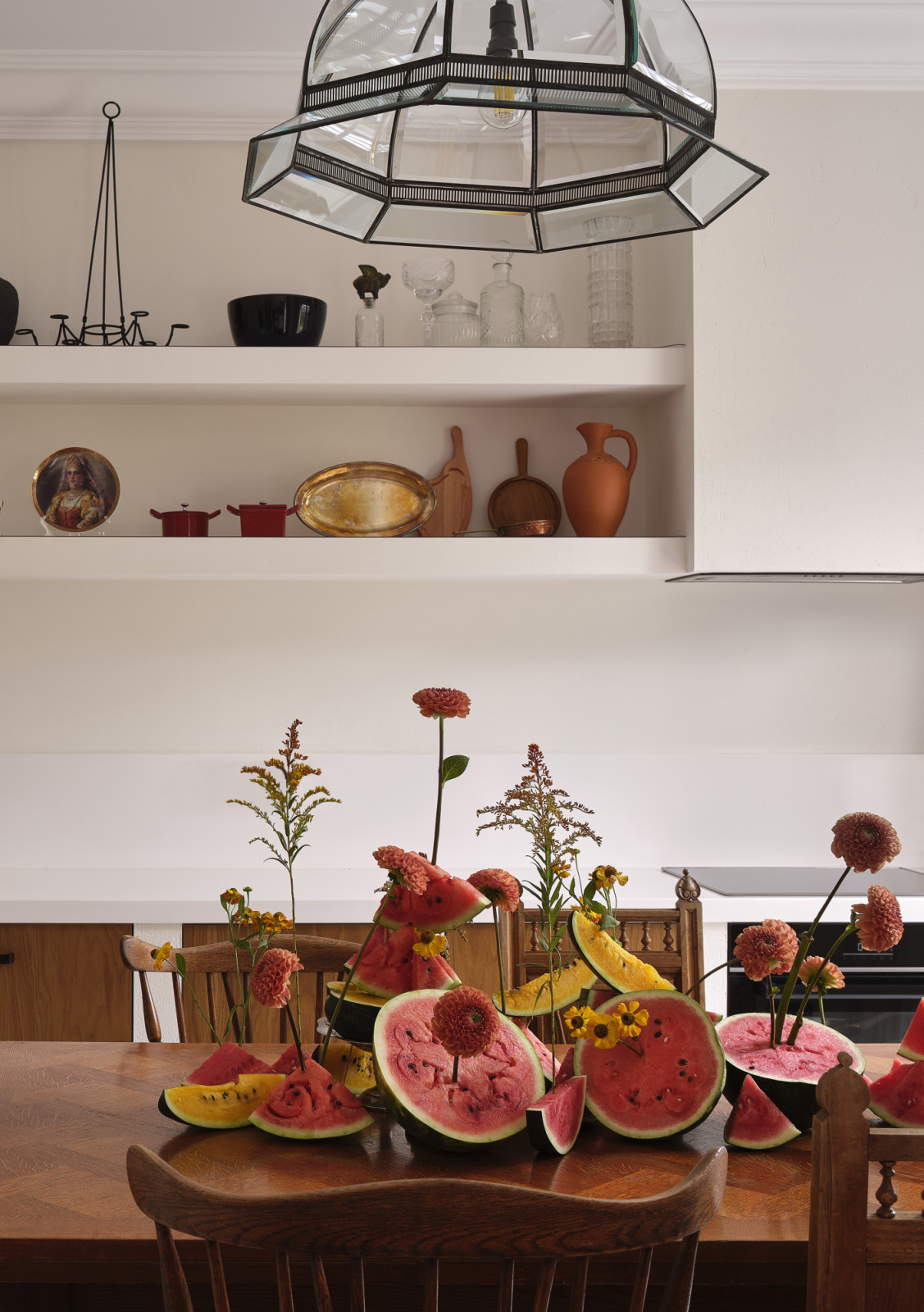 Vibrant fruits on display, echoing images of Dutch still life paintings from the 16th and 17th centuries, are laid out on the dining table of Sara Mikhailova's home in Moscow, Russia