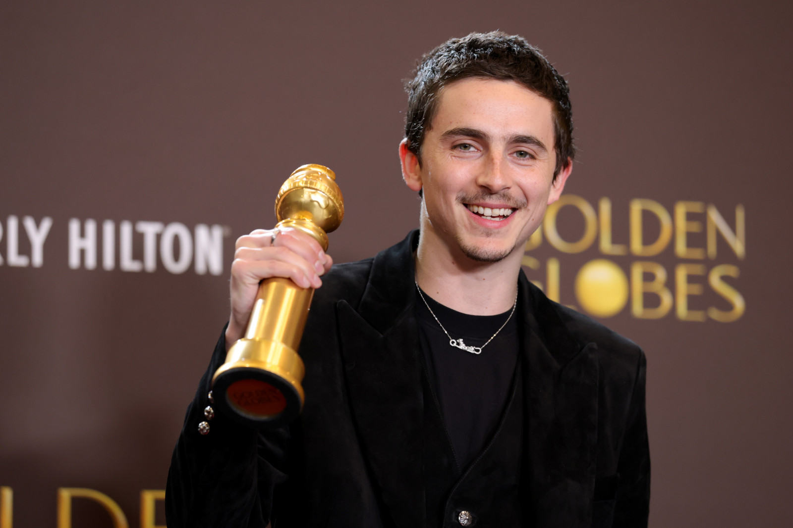 Timothée Chalamet with his Golden Globe for Best Performance by a Male Actor in a Motion Picture – Musical or Comedy for ‘Marty Supreme’ (Photo: Frazer Harrison/WireImage)