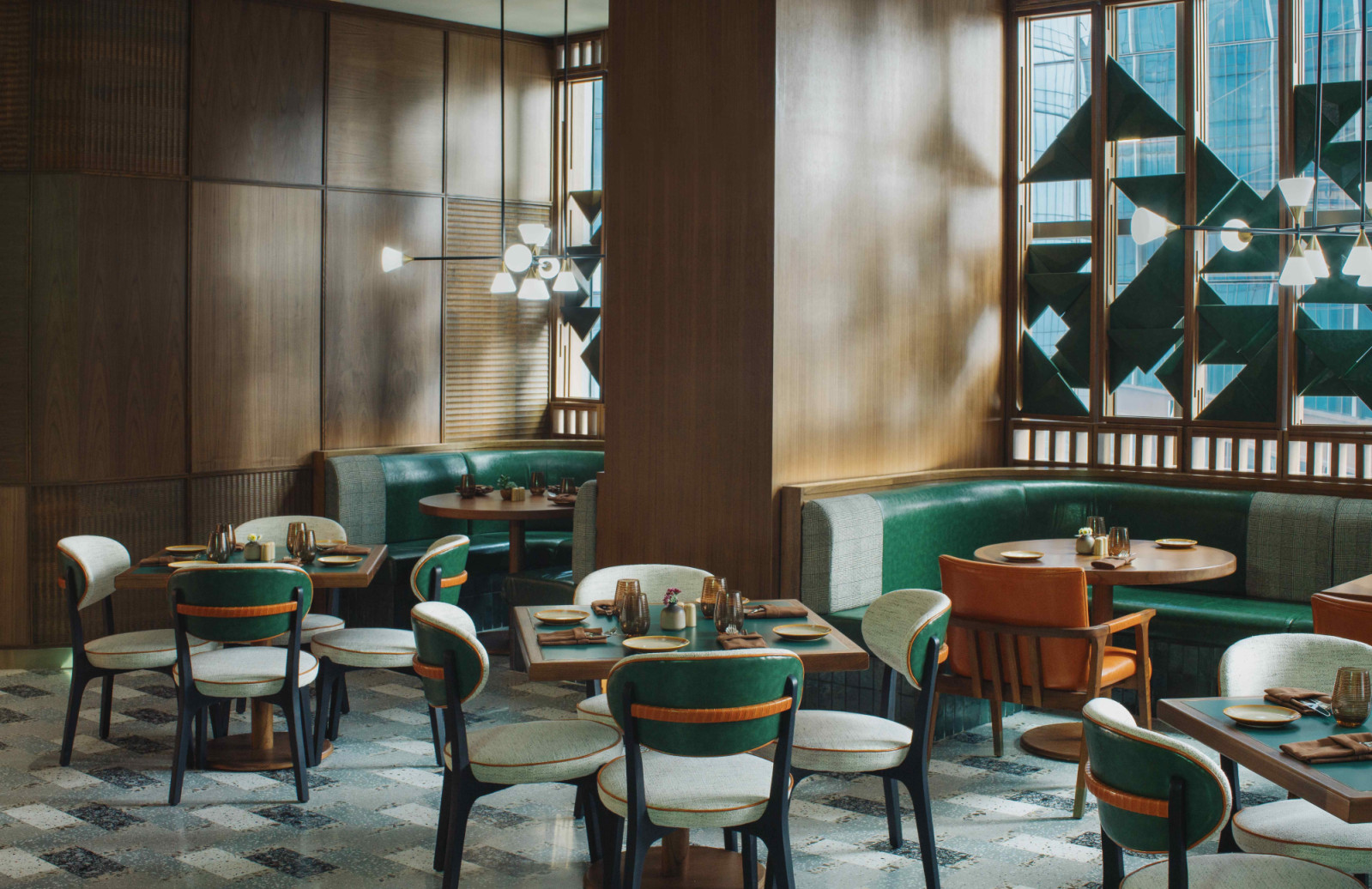 Window screens inspired by woven baskets and food wrappings, filtering light through geometric patterns