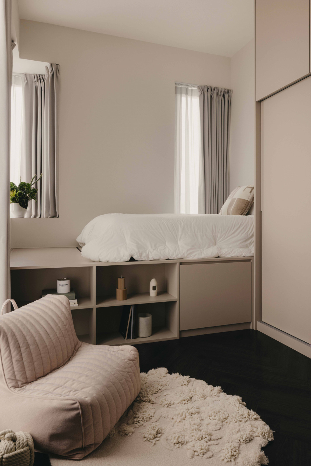 The daughter’s bedroom features a soft pink undertone