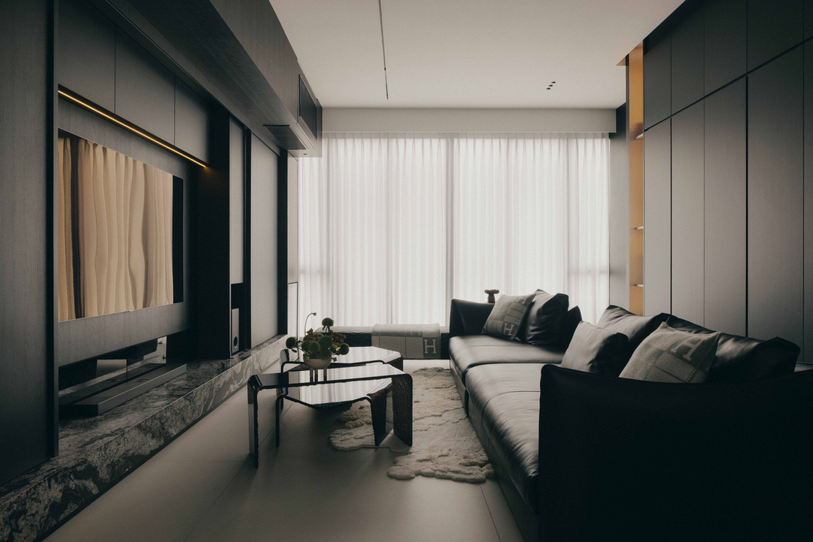 Clad in dark-stained wood, the apartment’s living room exudes an intimate ambience while still drawing in adequate daylight through its floor-to-ceiling panes