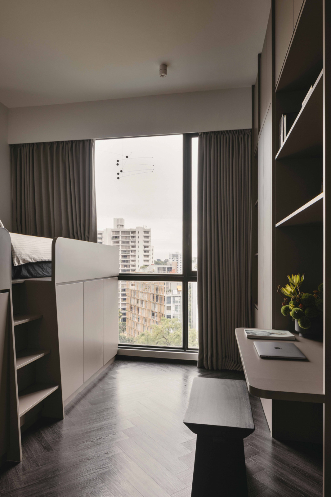Whether reading or resting, the boys can enjoy skyline views from their room