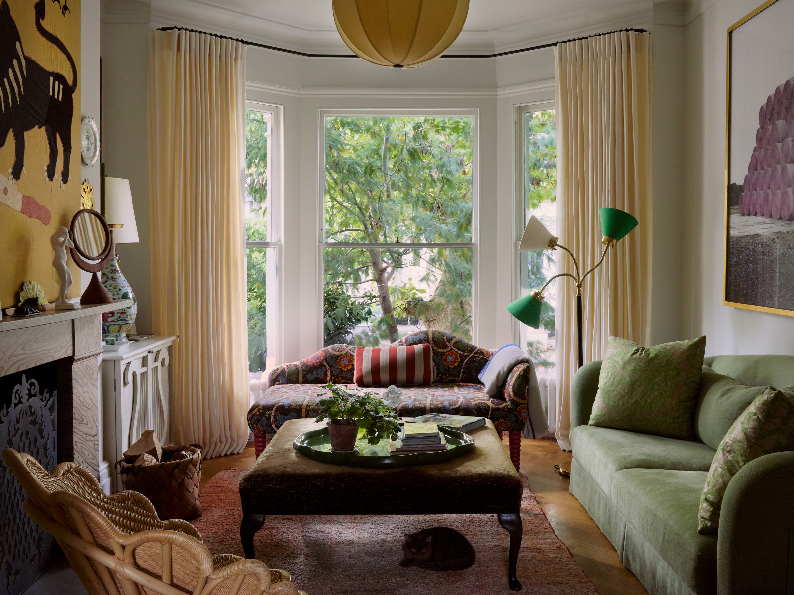 The dynamic, ever-evolving library in Beata Heuman's space is infused with whimsical charm