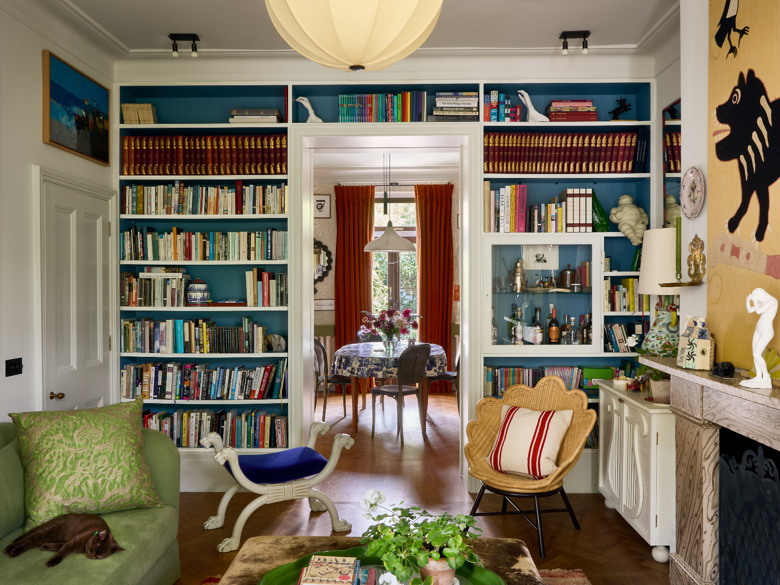 The dynamic, ever-evolving library in Beata Heuman's space is infused with whimsical charm