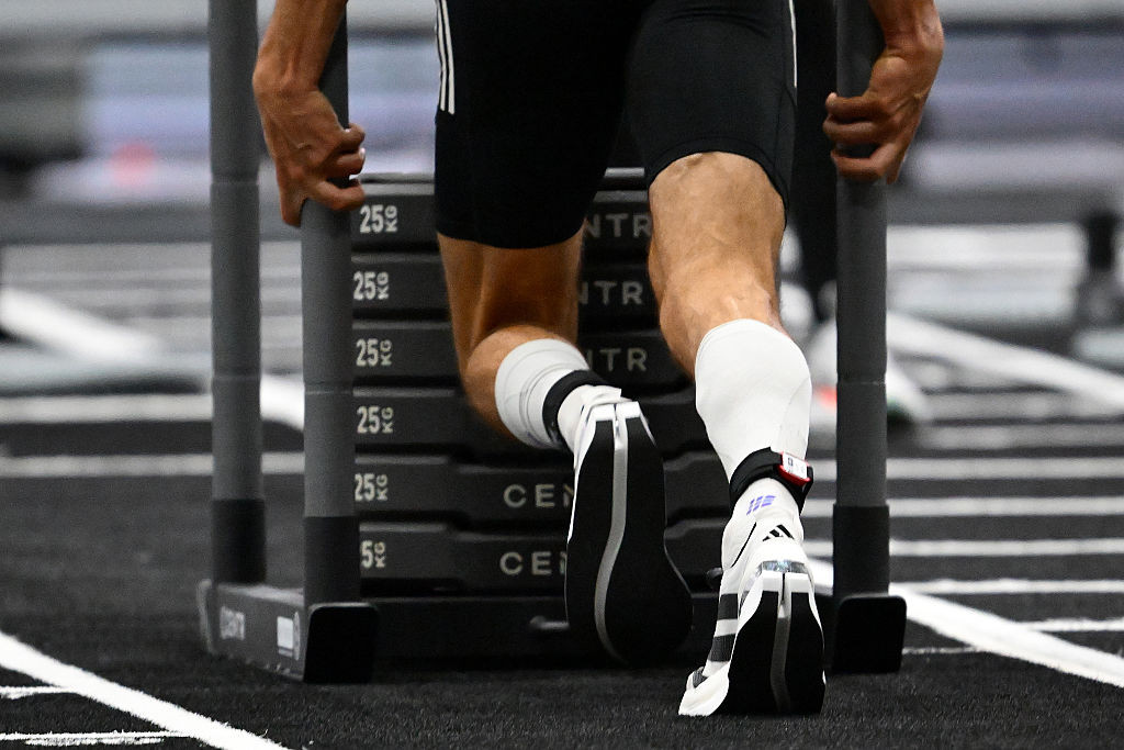MELBOURNE, AUSTRALIA - DECEMBER 12: Tim Wenisch of Germany competes during the HYROX Melbourne at The Melbourne Convention and Exhibition Centre on December 12, 2025 in Melbourne, Australia. Wenisch won the Hyrox Elite 15 competition in the soon to be released Adizero Dropset. Hyrox is an indoor fitness competition that combines running and functional workout stations. (Photo by Quinn Rooney/Getty Images for adidas)