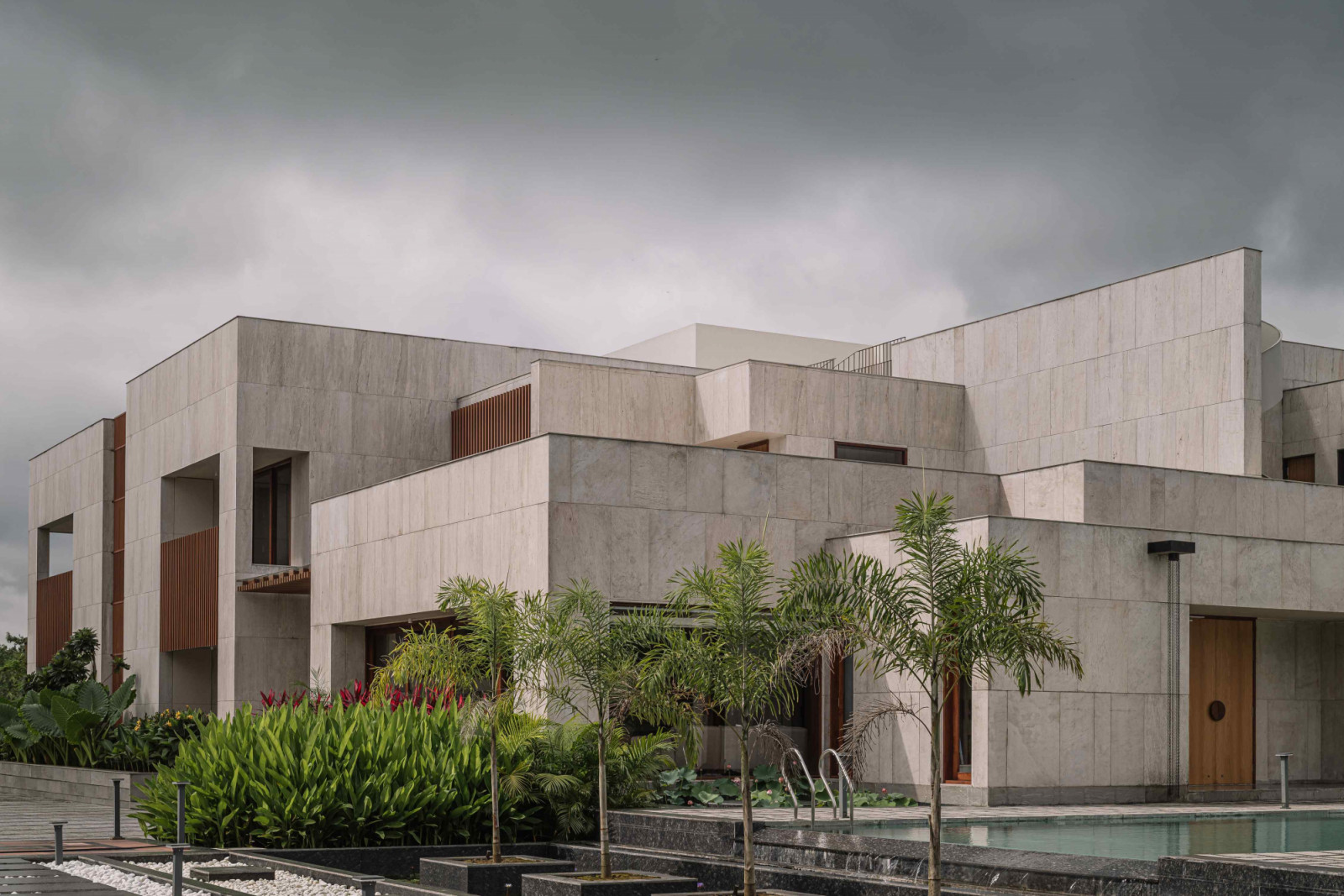 A composition of cuboidal volumes, unfolding in layers of mass and void