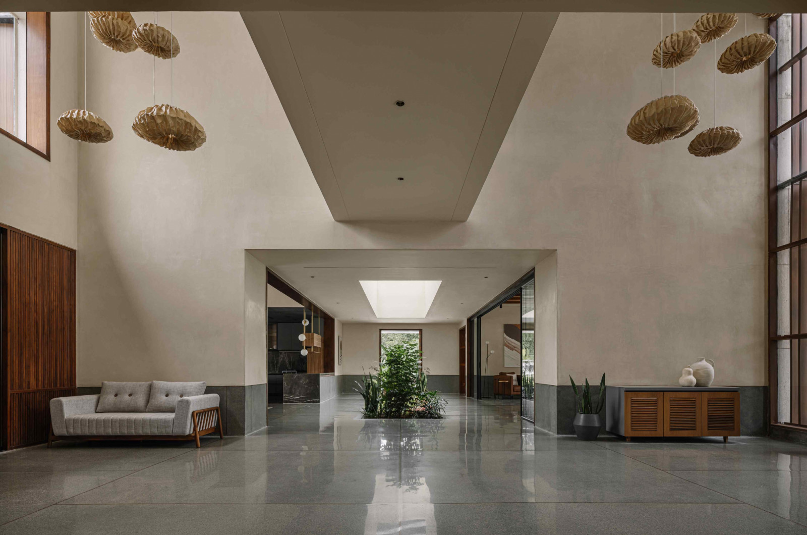 The soaring vestibule sets a tone of lightness and connectivity