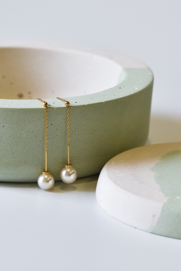 A pair of Akoya pearl earrings, carefully matched for size, shape, colour, and lustre
