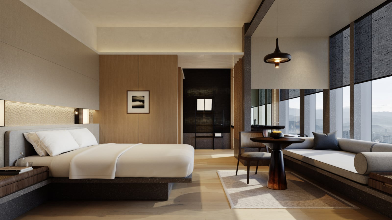 The hotel rooms gently contrast the city’s dynamic pace; panoramic windows soften the neutral palette with an inviting warmth