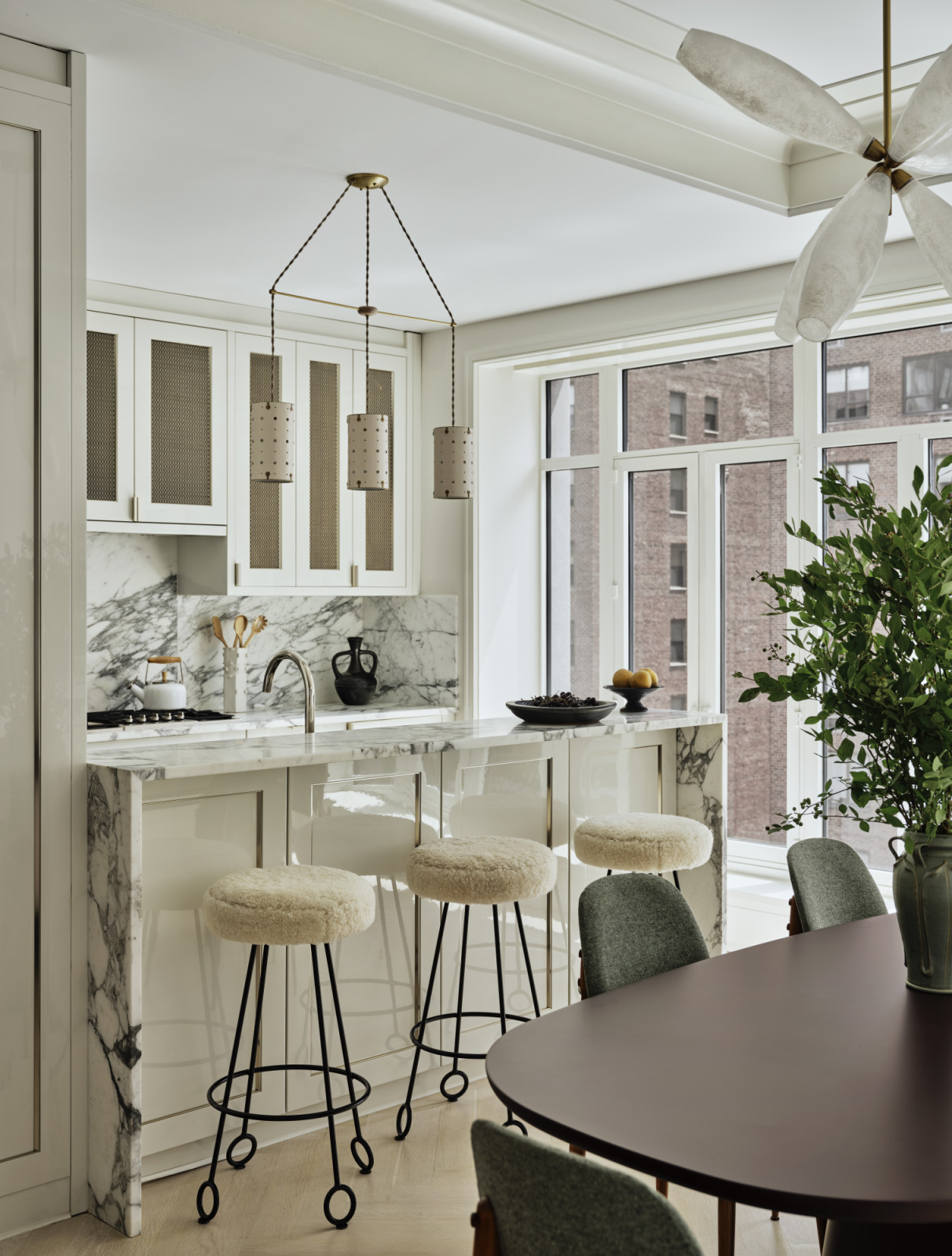 The kitchen and dining area in a New York apartment, designed by Lucy Harris