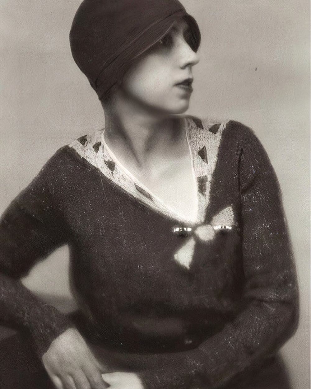 Elsa Schiaparelli wearing one of her signature trompe-l’oeil sweaters (Photo: schiaparelli.archive/Instagram)
