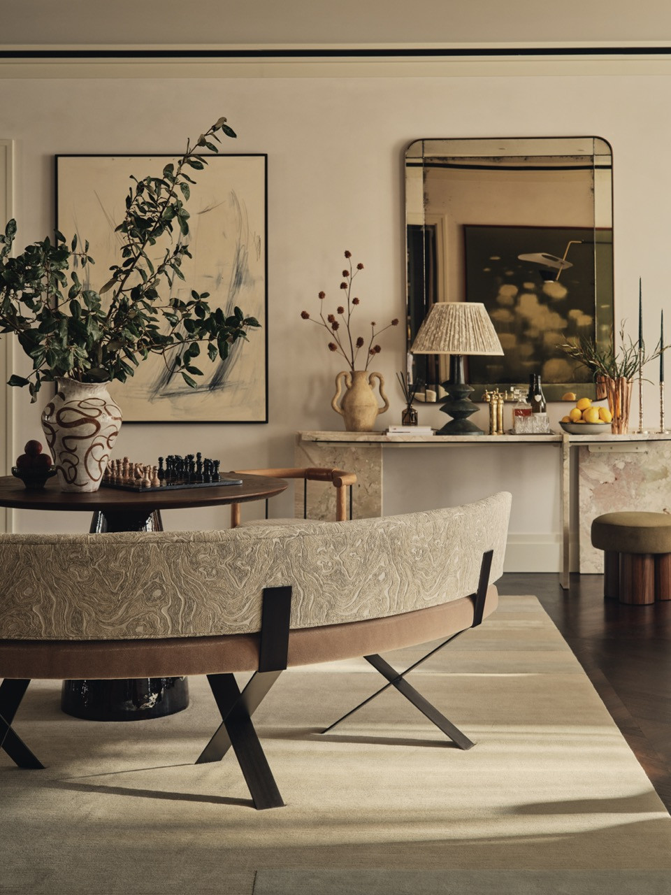 The dining area has a Galvin Brothers table, reflecting the apartment’s multiple functional zones within the main living space