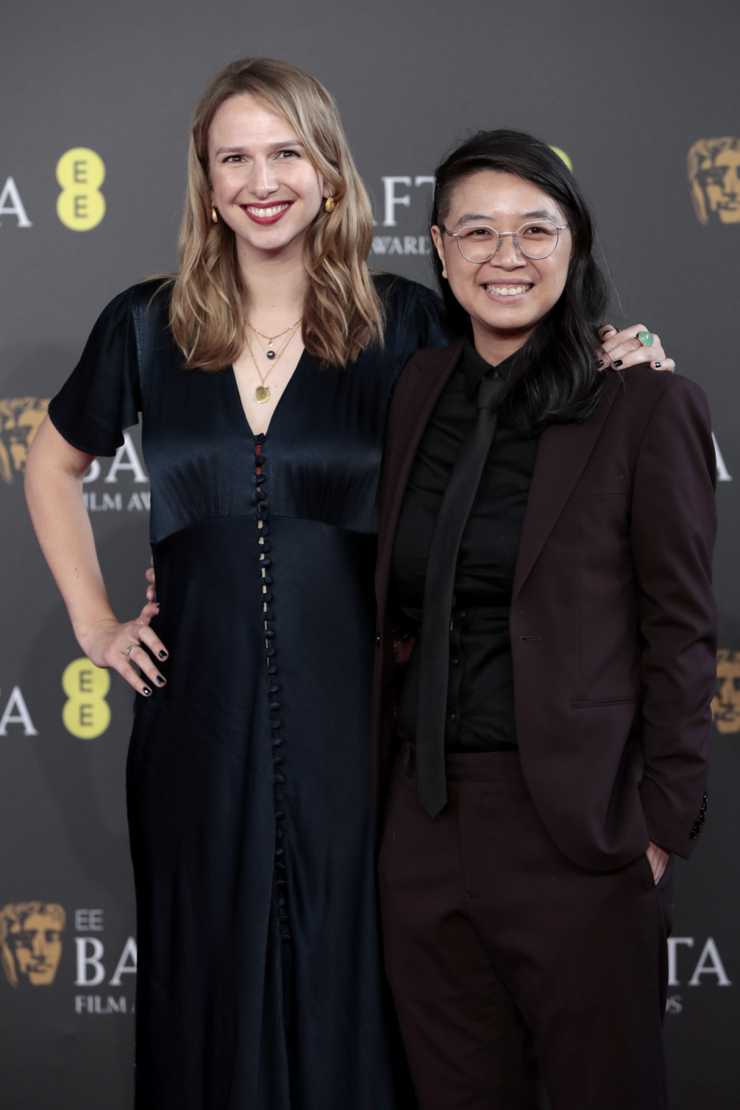 LONDON, ENGLAND - FEBRUARY 18: Charmaine Chan (R) and guest attend the EE BAFTA Film Awards 2024 at The Royal Festival Hall on February 18, 2024 in London, England. (Photo by John Phillips/Getty Images)