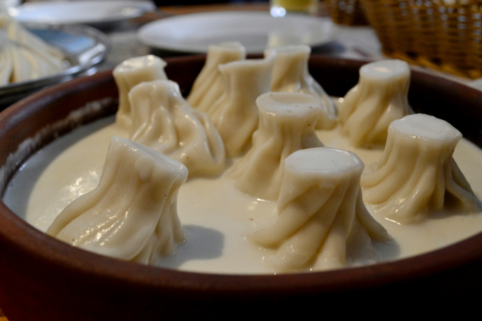 Khinkali are soup-filled dumplings designed to be lifted, bitten, and carefully sipped (Photo: Ksenia Berzoj/Unsplash)
