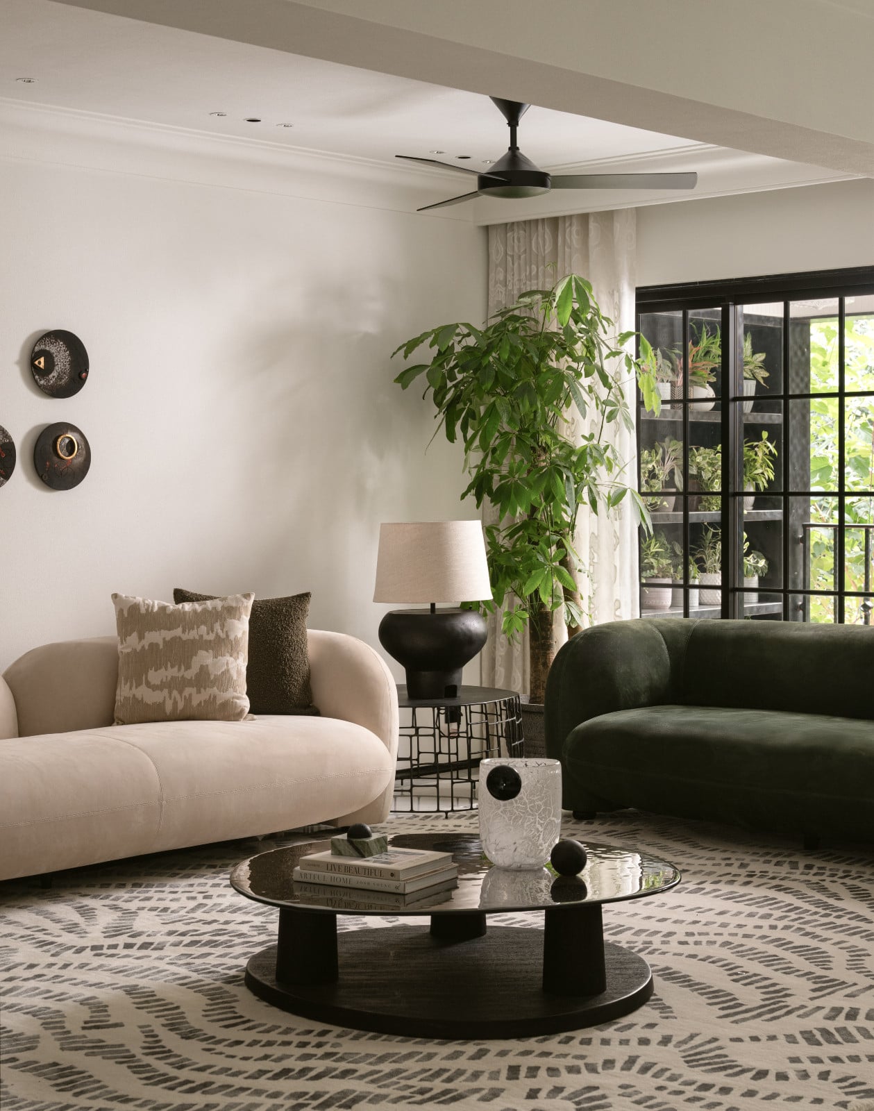 The living room in a neoclassical family home designed by Palindrome Space in Mumbai, India
