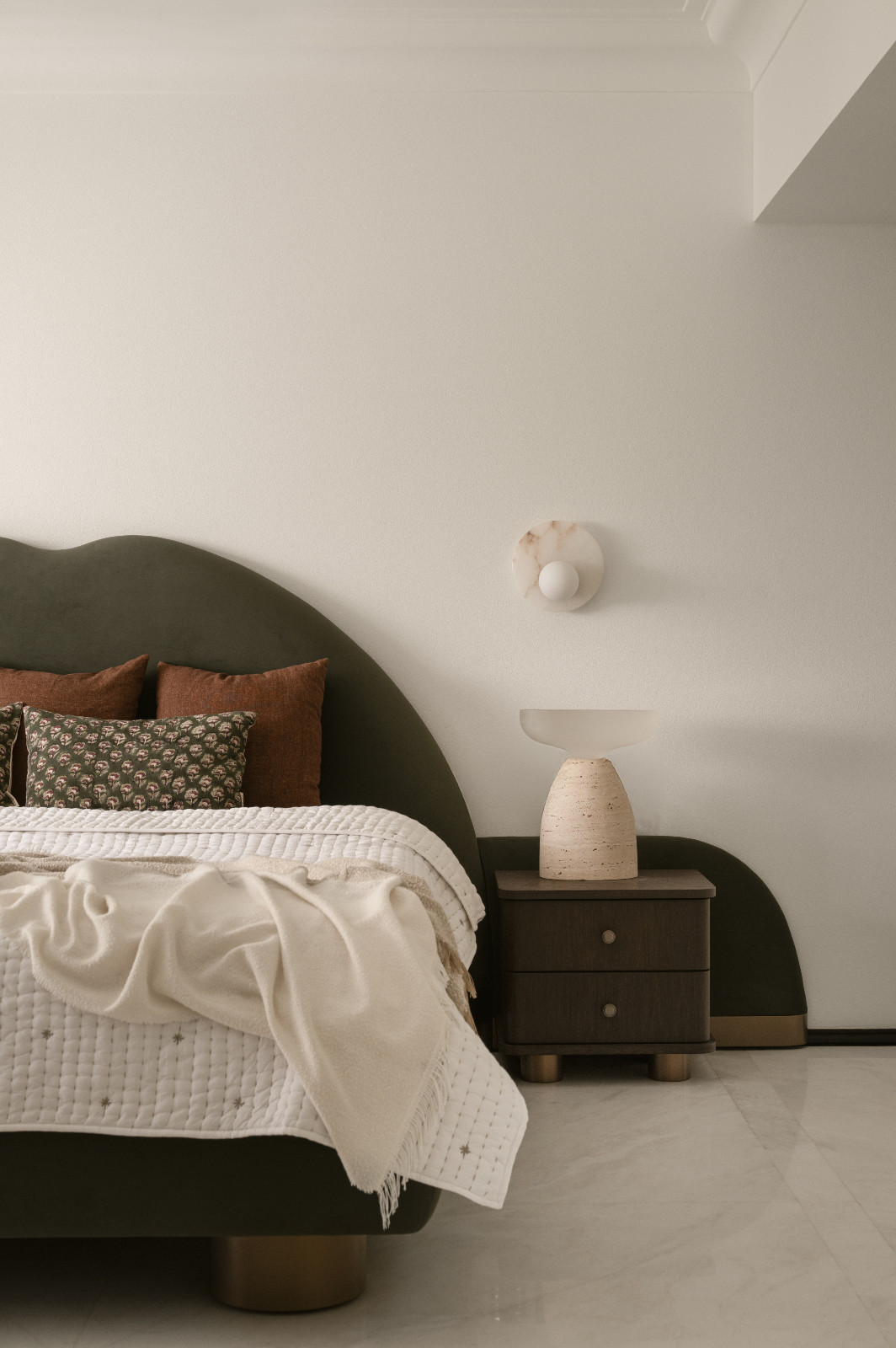 A bedroom in a neoclassical family home designed by Palindrome Space in Mumbai, India