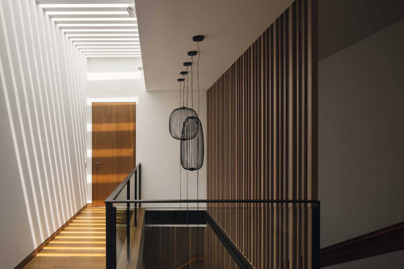 The interplay of light and shadow brings a sense of dynamism to the attic level