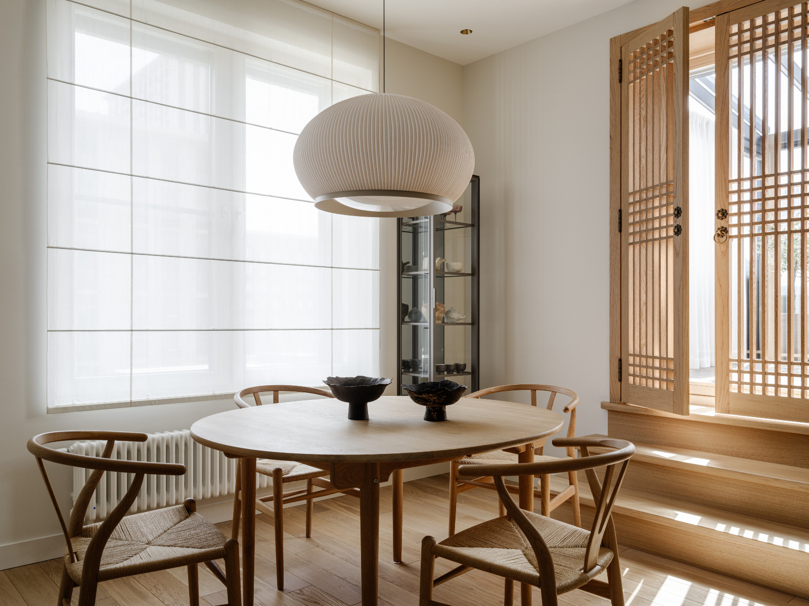 The breakfast nook in a Korean-inspired home in Moscow, Russia by Inga Kordya