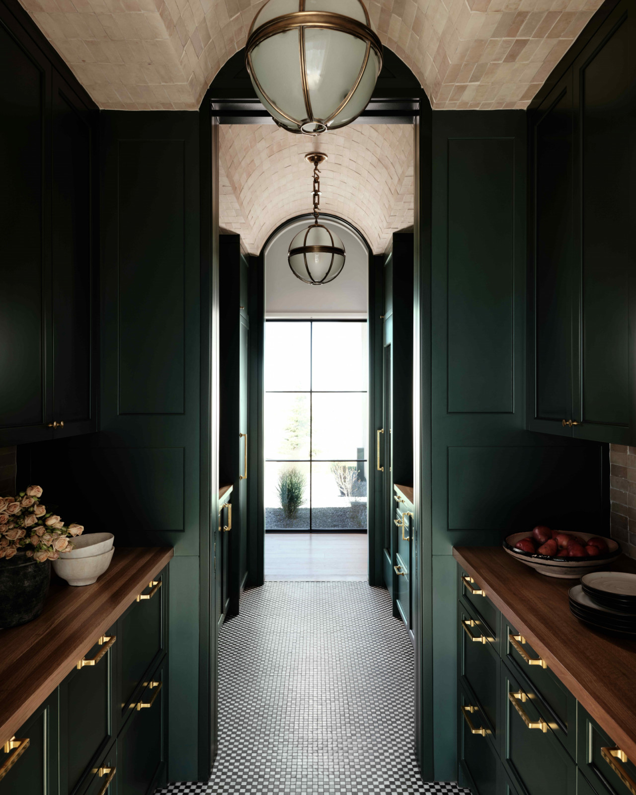 The walk-through pantry and bar introduce a whimsy note