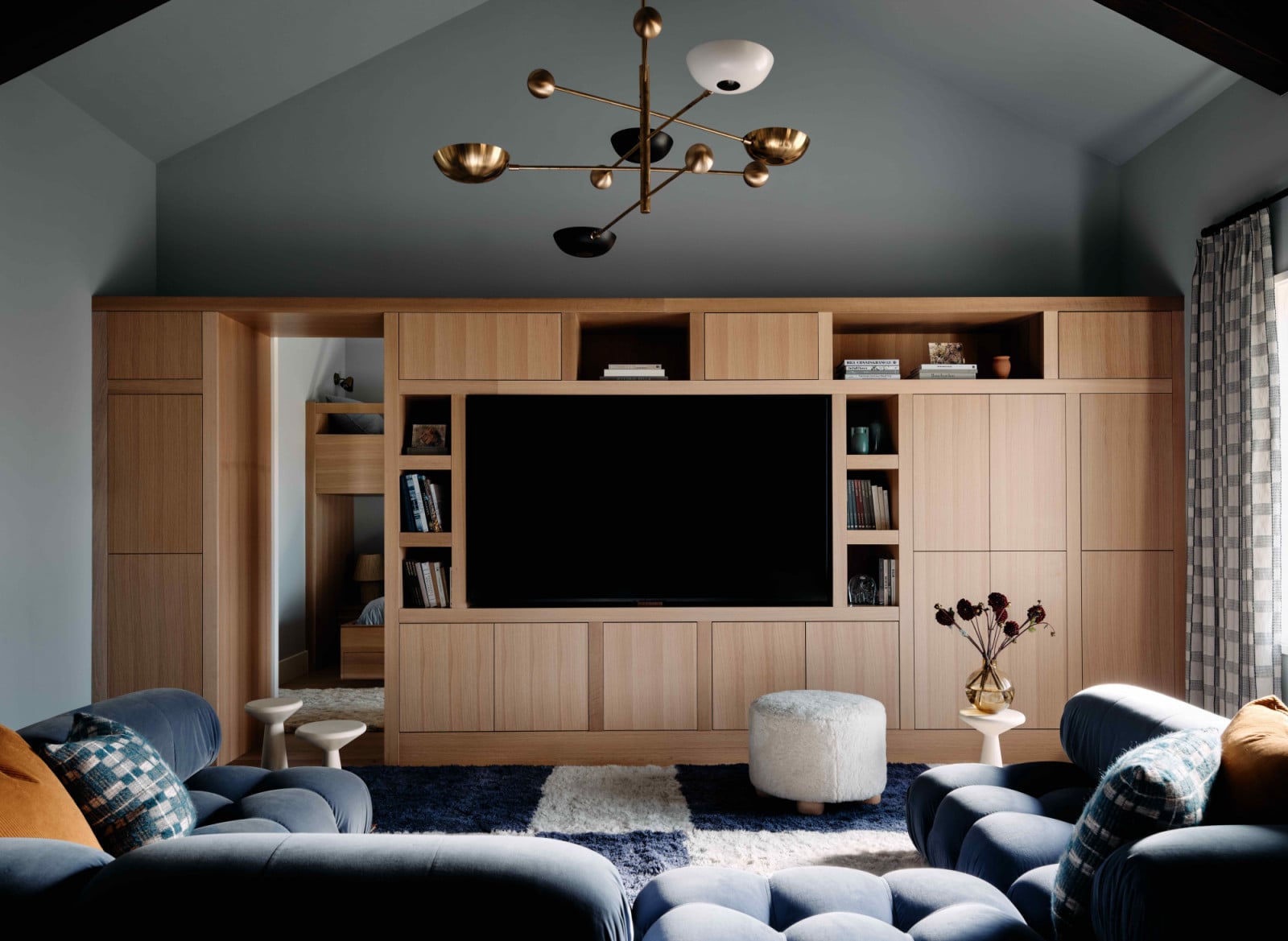 Warm white oak millwork offers a soft, organic warmth