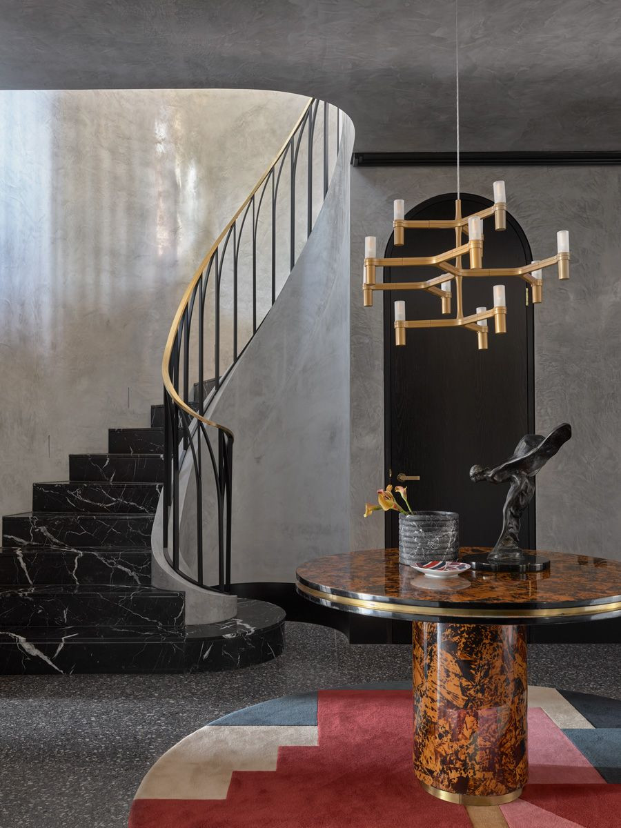 A Willy Rizzo dining table sourced from 1stdibs.com is placed on the Delaunay rug by Greg Natale in the hall (Photo: Anson Smart)