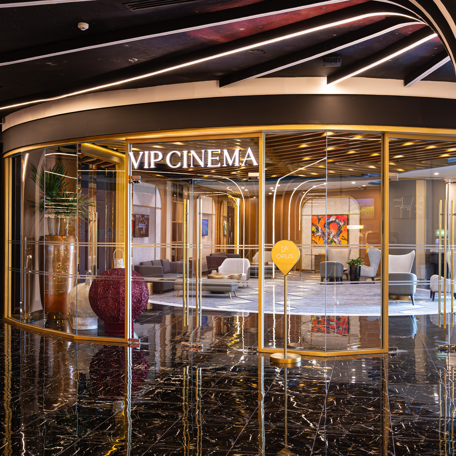 Experience the ultimate cinematic ritual within the Opus VIP Cinema, featuring plush privacy cocoons and state-of-the-art sophistication.