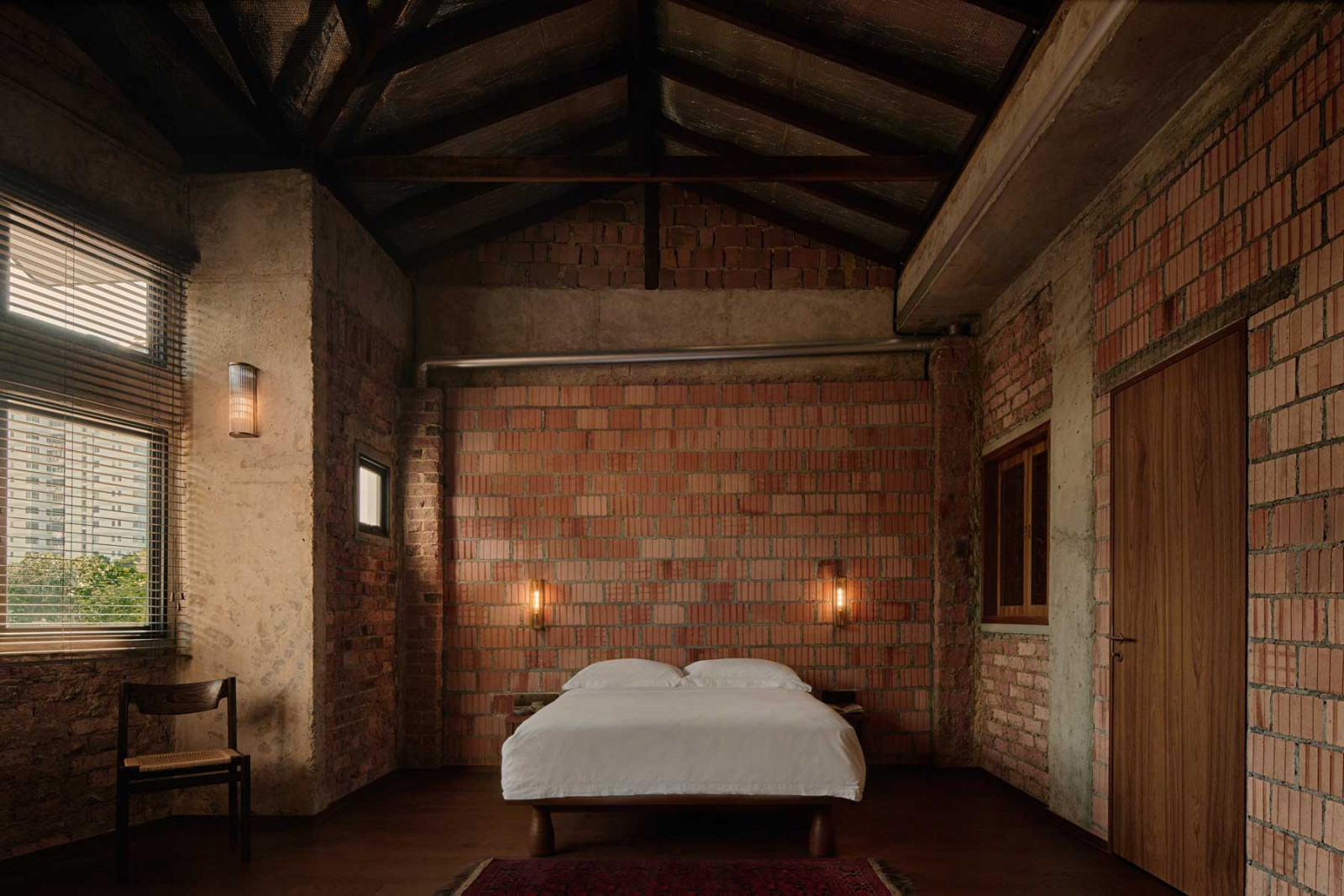 The bedroom of My Last Home, a residential project for a retired professor by L Architects, led by laureate Lim Shing Hui (Photo: Jovian Lim)