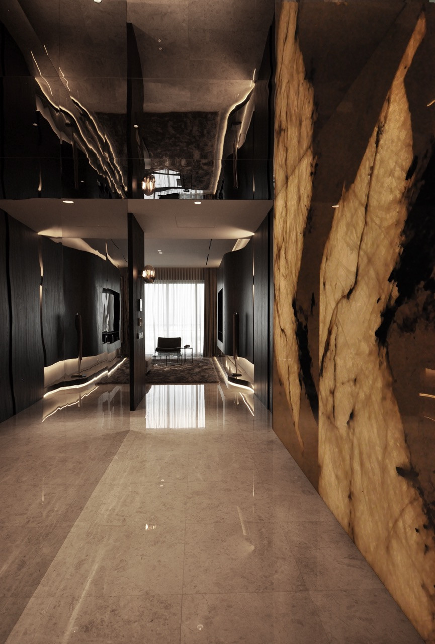 The vestibule passage features backlit Patagonia quartzite opposite mirror-polished surfaces creating layered reflections