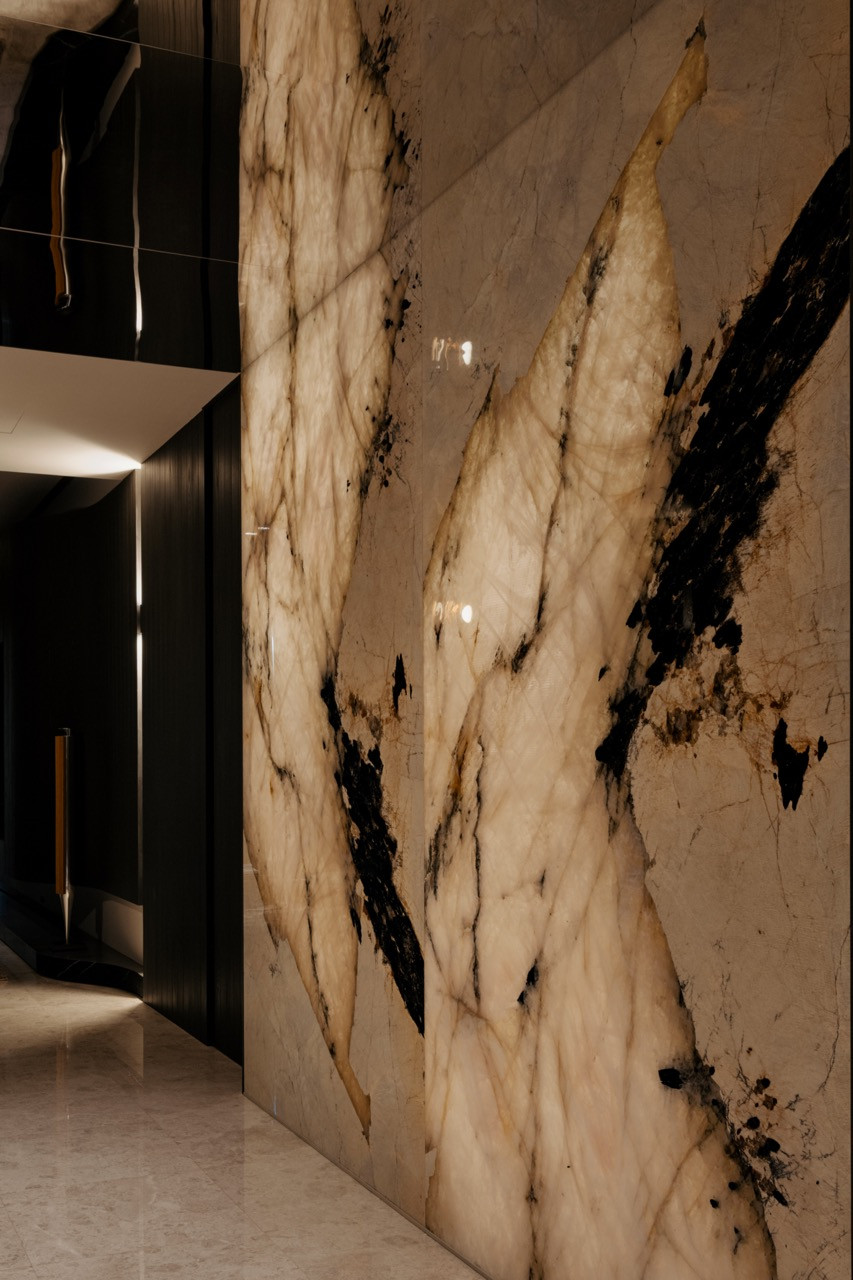 Close-up of the backlit Patagonia quartzite granite wall arranged in deliberate asymmetry