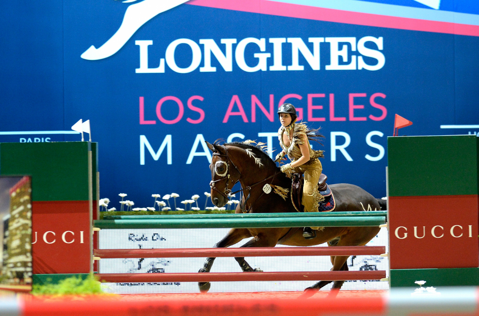 Actress Kaley Cuoco performs at the Charity Pro-AM class at Longines Los Angeles Masters in 2014 (Photo by Kevork Djansezian/Getty Images for Masters Grand Slam Indoor)