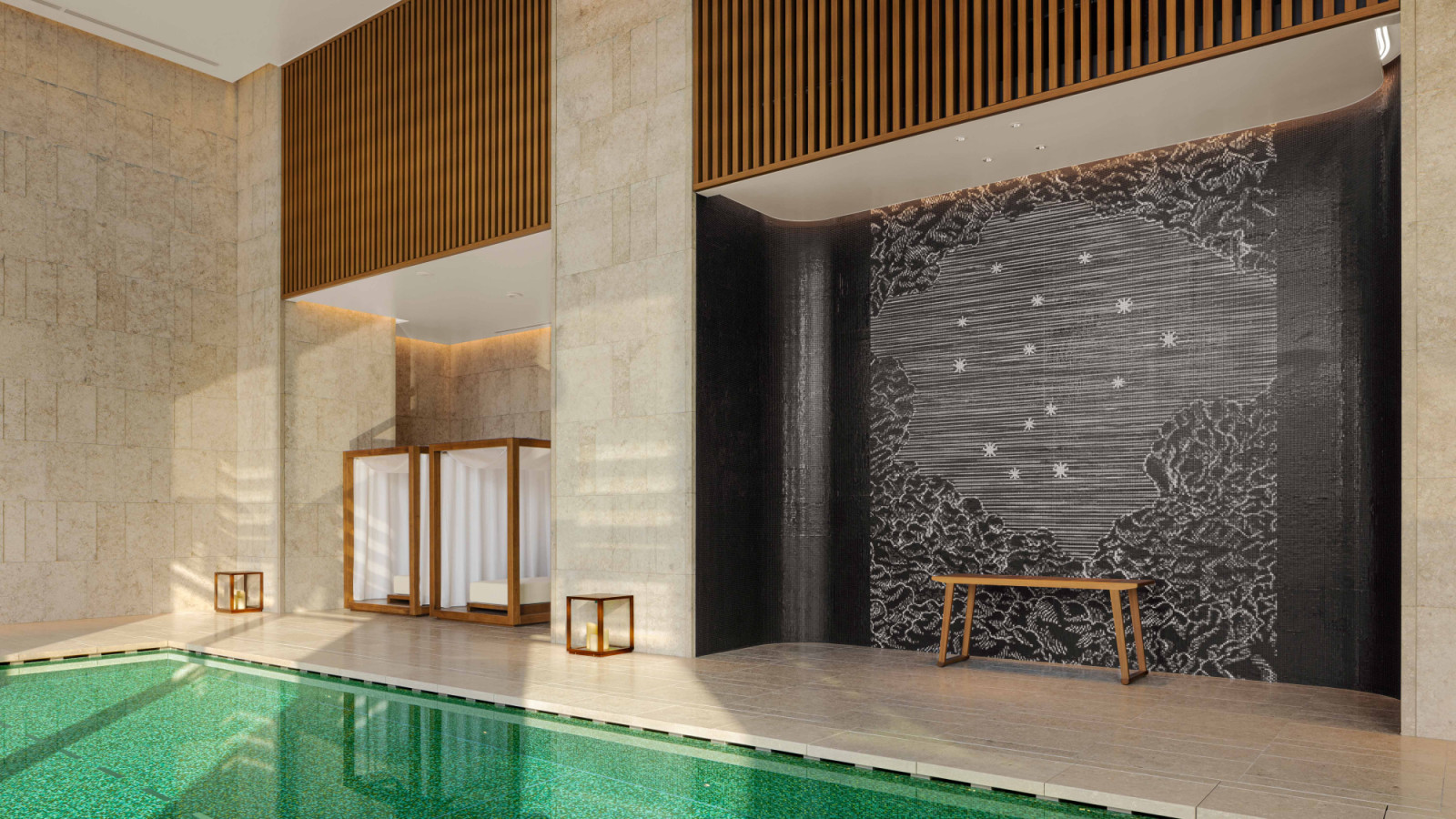 Adjacent to the main pool, the vitality pool references the ancient Baths of Caracalla, where patterned mosaics, flowing water and travertine surfaces recall the ritualistic calm of Roman bathing traditions