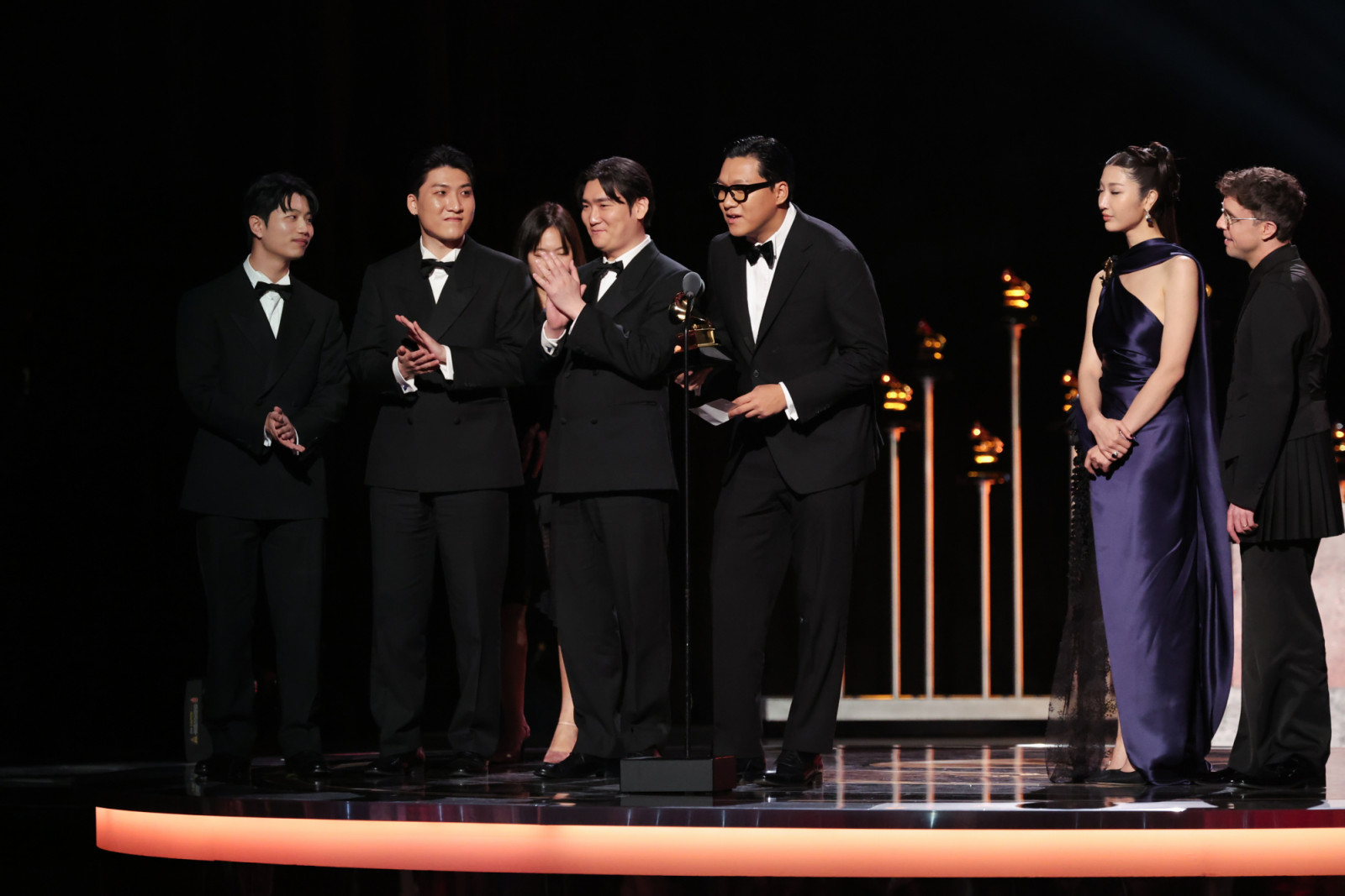 Yuhan, 24, Ejae and Mark Sonnenblick accept the Best Song Written For Visual Media award for "Golden" from KPop Demon Hunters onstage at the 68th GRAMMY Awards held at the Crypto.com Arena on February 01, 2026 in Los Angeles, California. (Photo by Rich Polk/Billboard via Getty Images)
