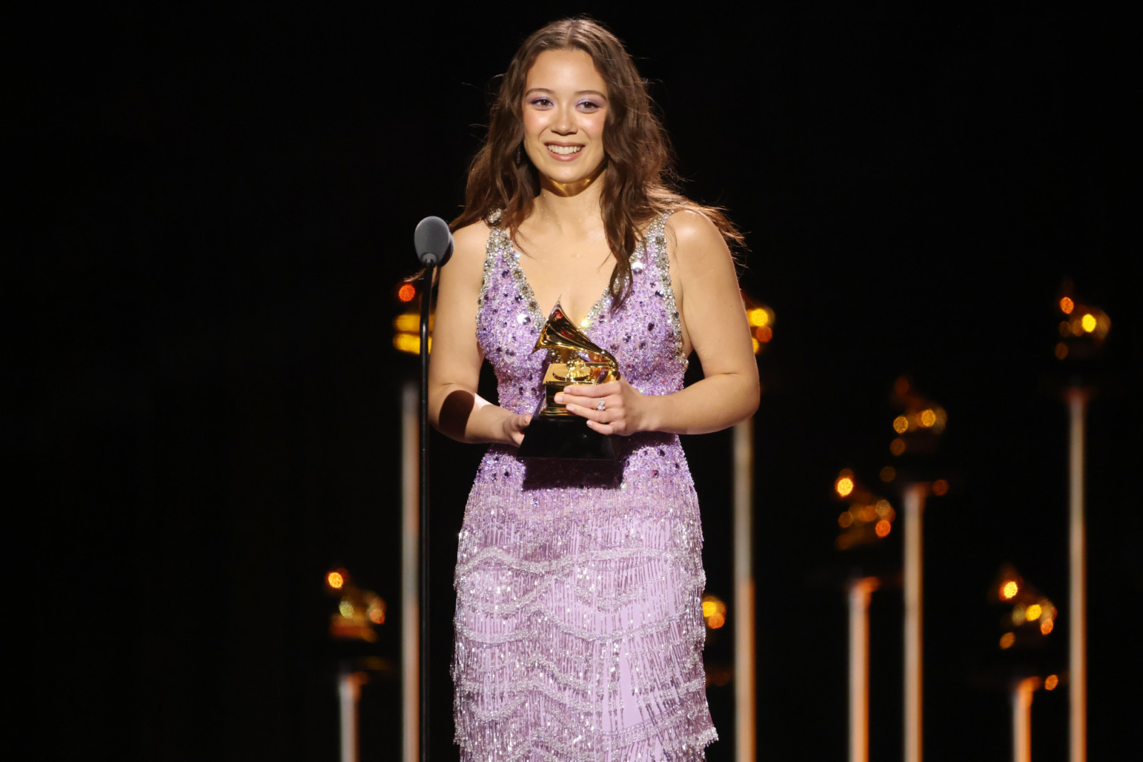 LOS ANGELES, CALIFORNIA - FEBRUARY 01: (FOR EDITORIAL USE ONLY) Laufey accepts the Best Traditional Pop Vocal Album award for "A Matter Of Time" onstage during the 68th GRAMMY Awards Premiere Ceremony at Peacock Theater on February 01, 2026 in Los Angeles, California. (Photo by Frazer Harrison/Getty Images)