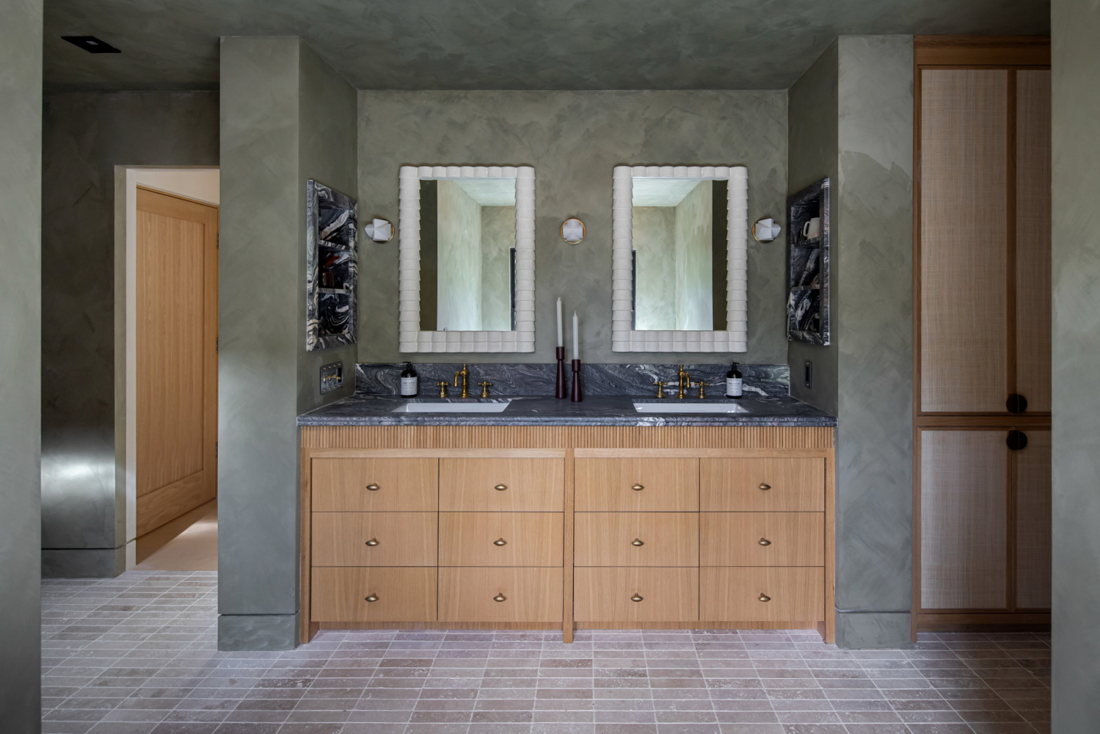 The primary bathroom of a renovated modern ranchette in Beverly Hills, Los Angeles designed by Samaha Studio