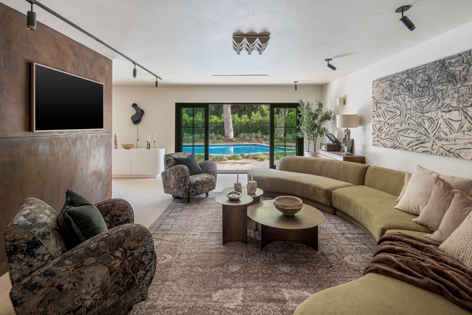 The entryway of a renovated modern ranchette in Beverly Hills, Los Angeles designed by Samaha Studio