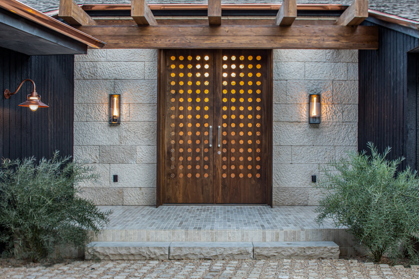 The entryway of a renovated modern ranchette in Beverly Hills, Los Angeles designed by Samaha Studio