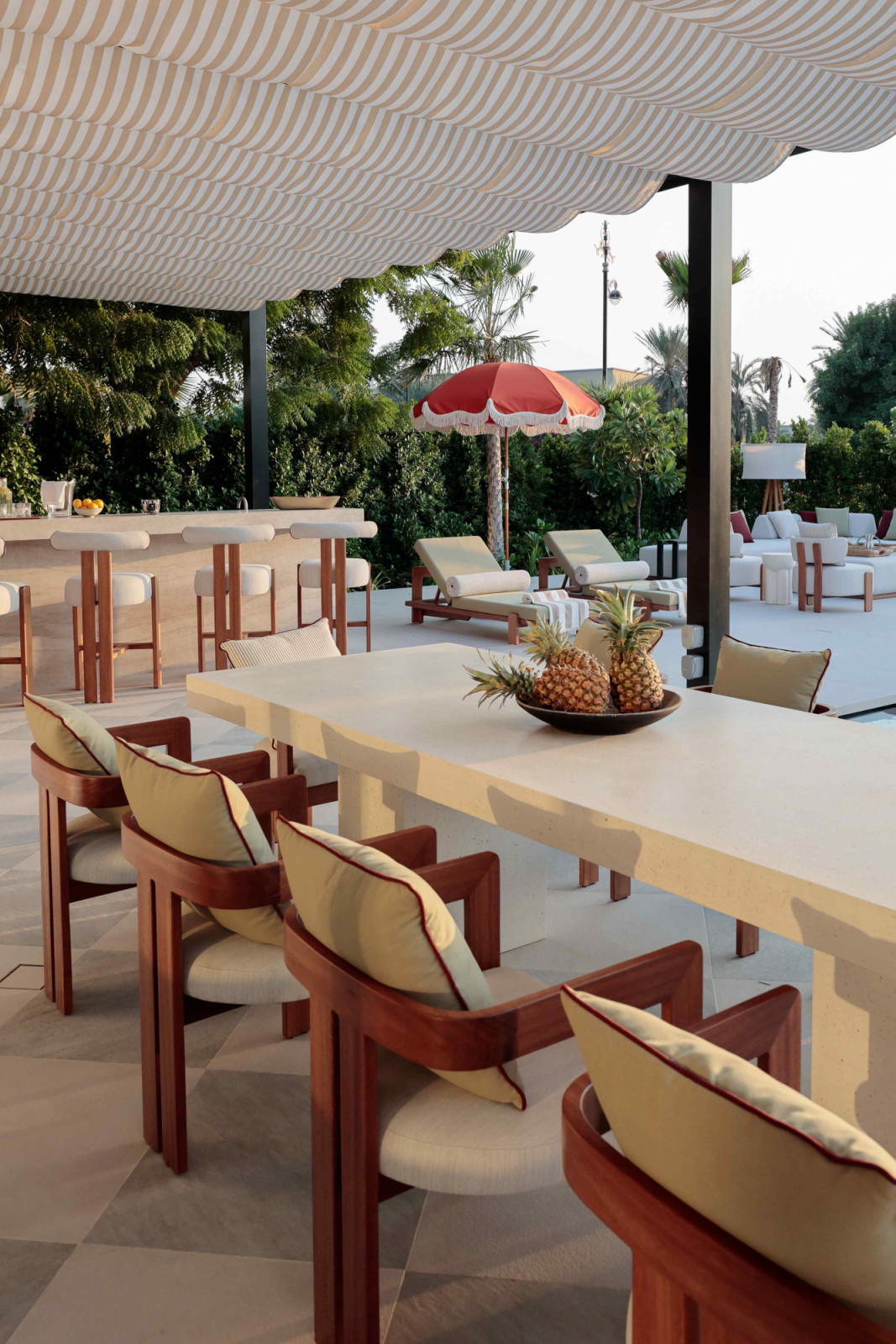 The Sorento Rectangular dining table from Loom Collection in the outdoor bar and dining area