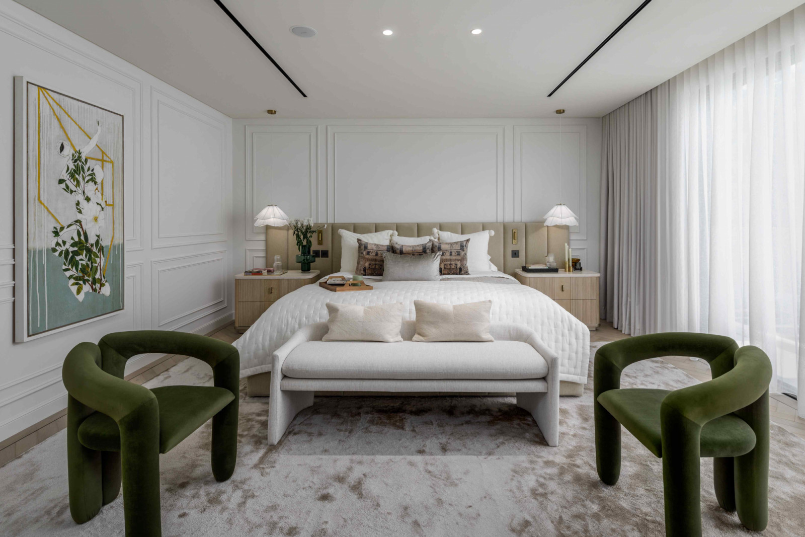 Green appears in softer, more nuanced applications in the master bedroom