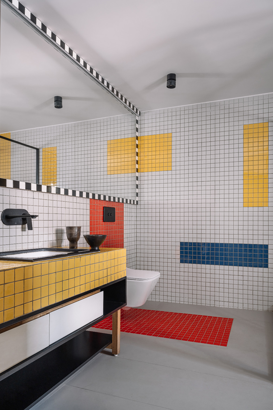 A bathroom in a multigenerational family home in Ahmedabad, India, designed by Compartment S4