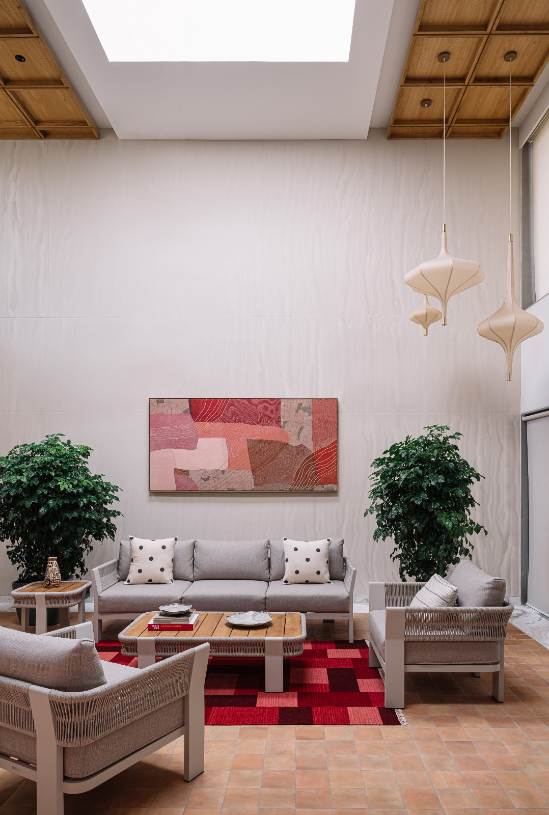 The living room of a multigenerational family home in Ahmedabad, India, designed by Compartment S4