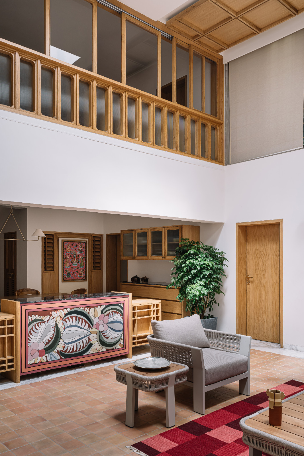 The living room of a multigenerational family home in Ahmedabad, India, designed by Compartment S4