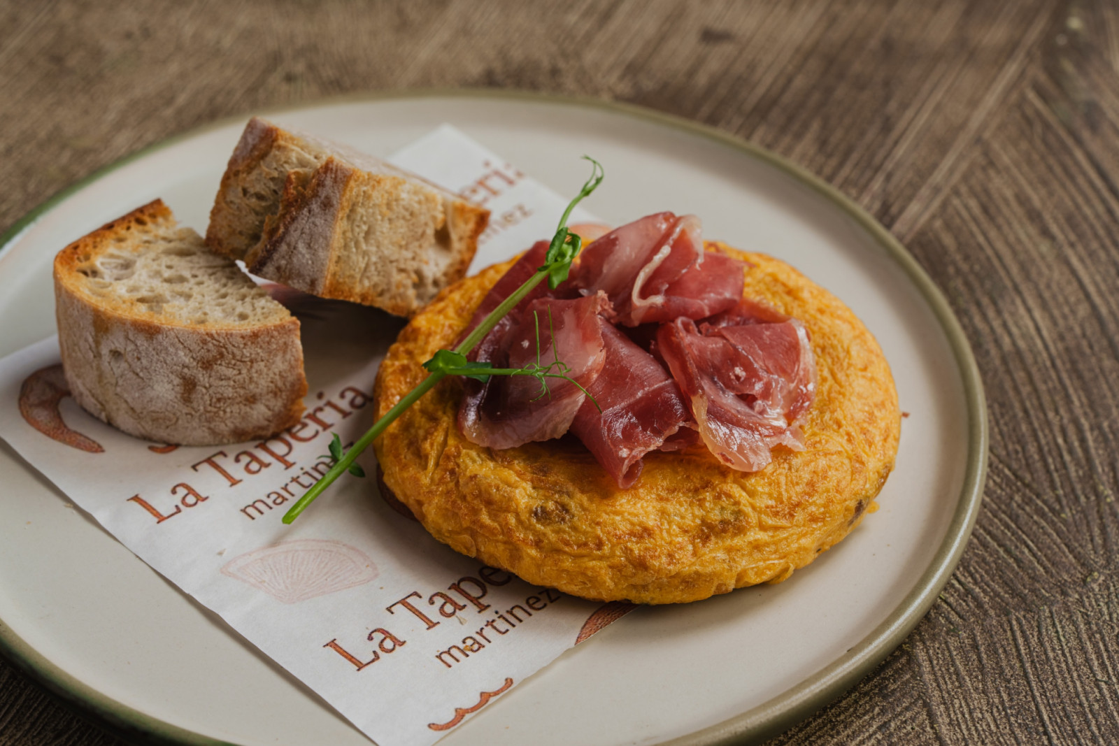 Tatler Dining February 2026 Radar - New restaurants, cafés and bars - La Taperia Martinez - Tortilla de patatas y cebolla caramelizada _ Potato omelette with caramelized onion